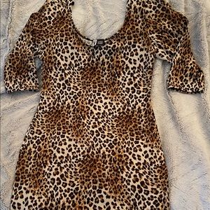 Little short Leopard dress or a long shirt with three-quarter inch sleeves